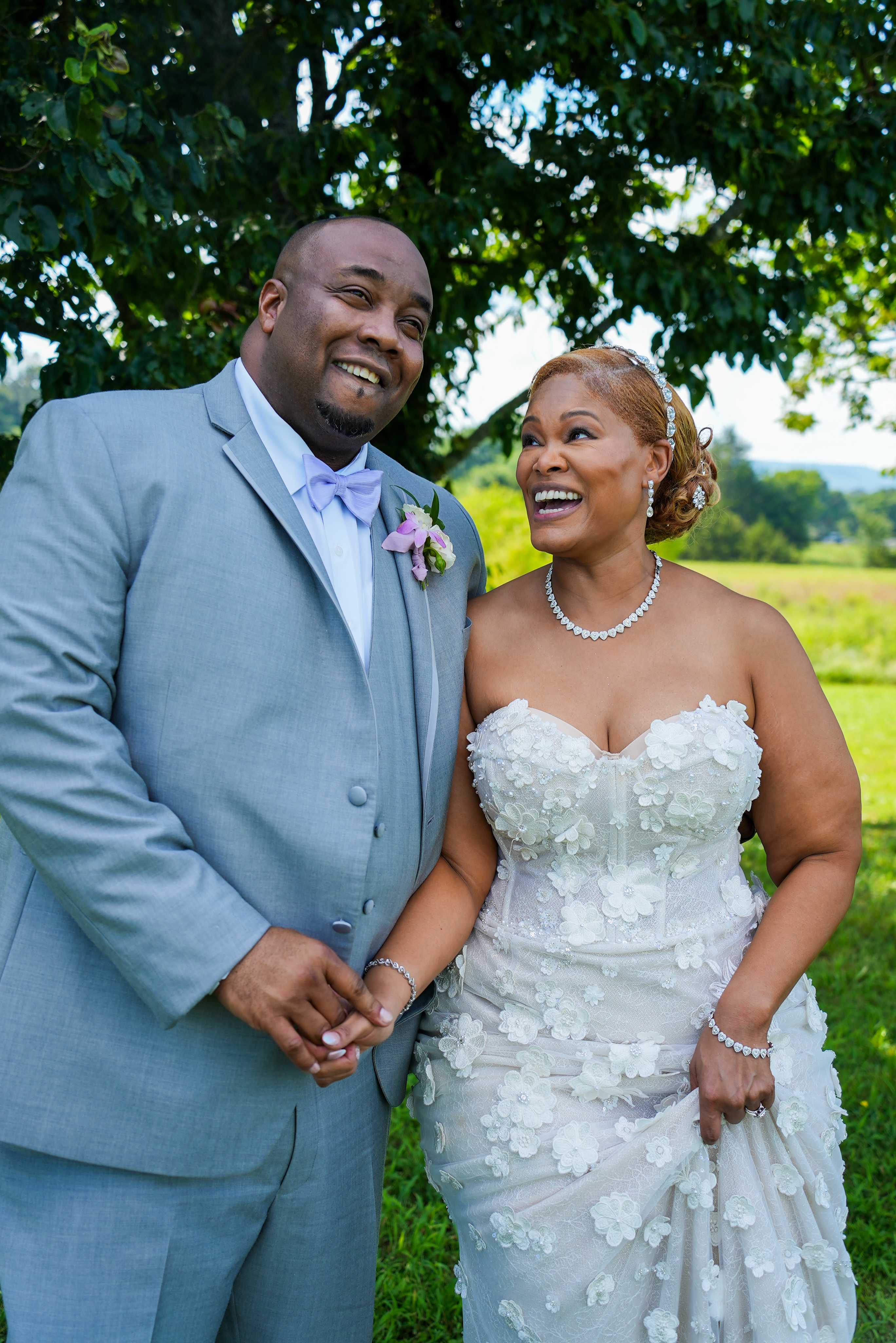 Bride and groom laughing together after wedding ceremony